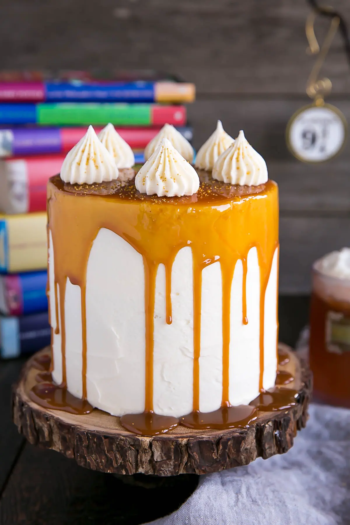 Harry Potter Cake! This Butterbeer cake combines butterscotch, cream soda, and marshmallow all in one spellbinding dessert. | livforcake.com Butterbeer Cake made with butterscotch, cream soda, and marshmallow.