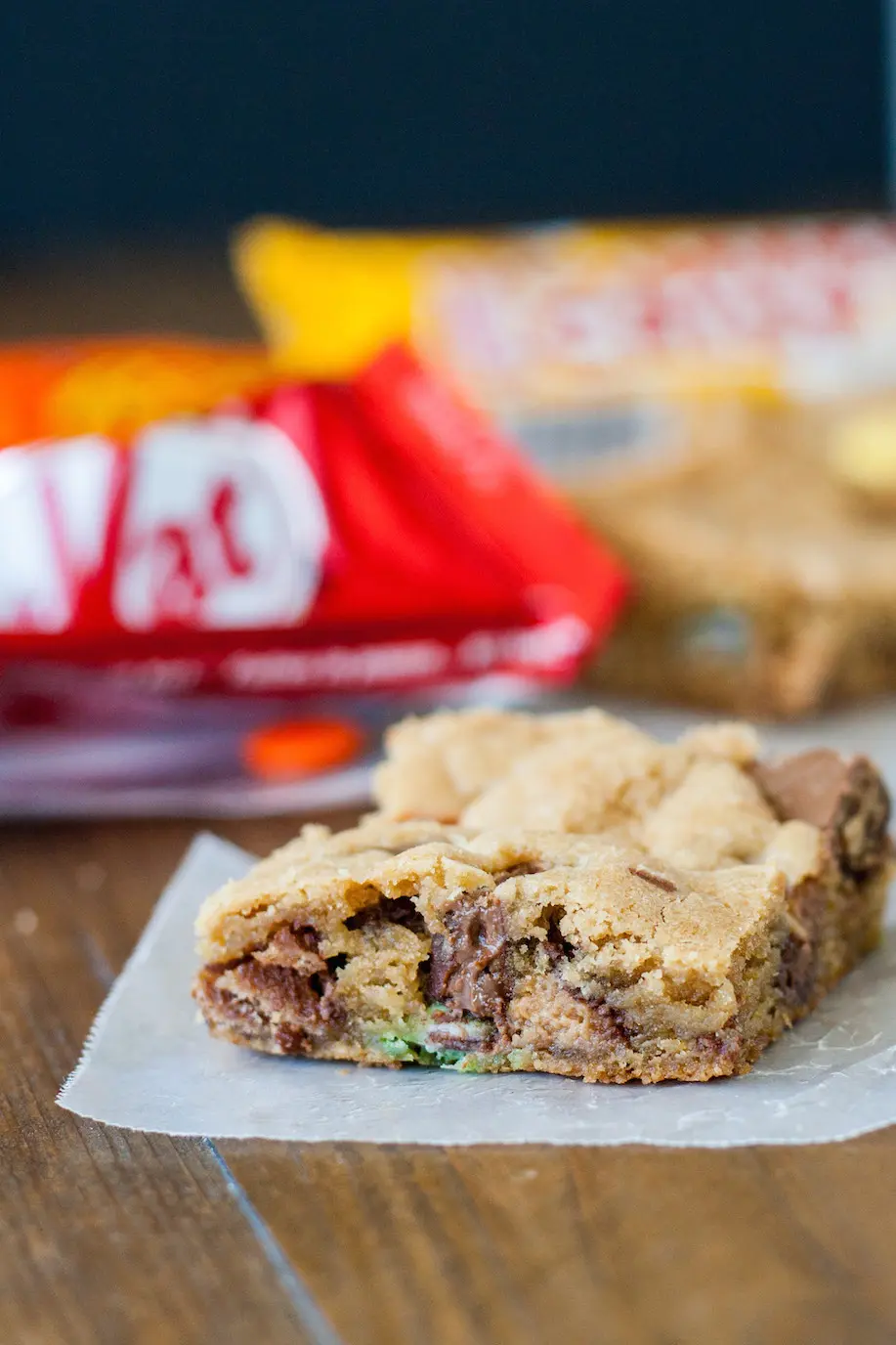 cookie bar with candy bars behind it.