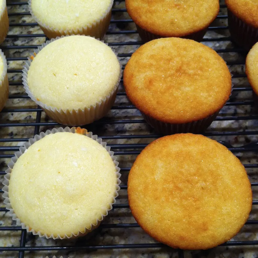 Cupcakes on a cooling rack.