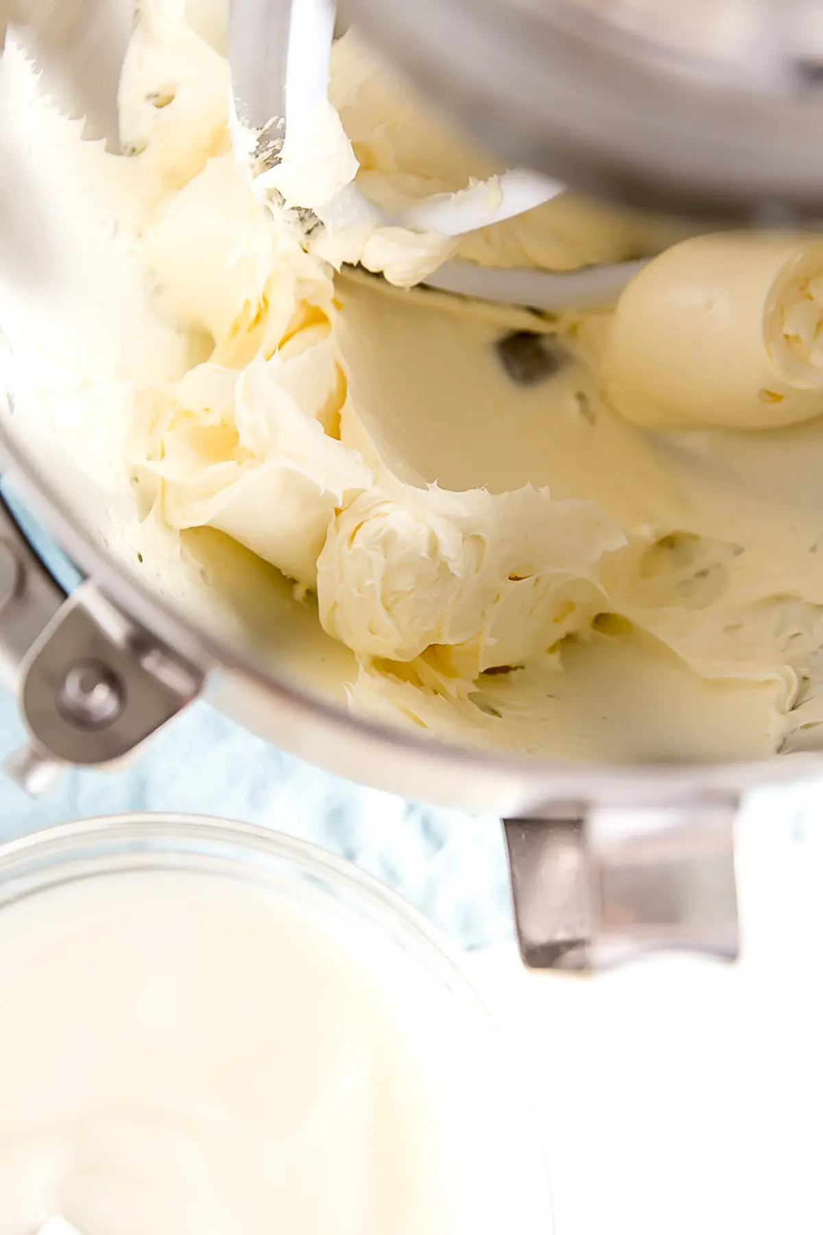 Ermine Frosting (also known as flour buttercream or heritage frosting) is an easy and delicious buttercream made with flour, sugar, milk, and butter. | livforcake.com Creamed butter in the bowl of a stand mixer.