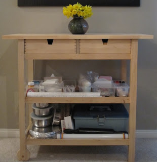 Cart with cake tools on it.