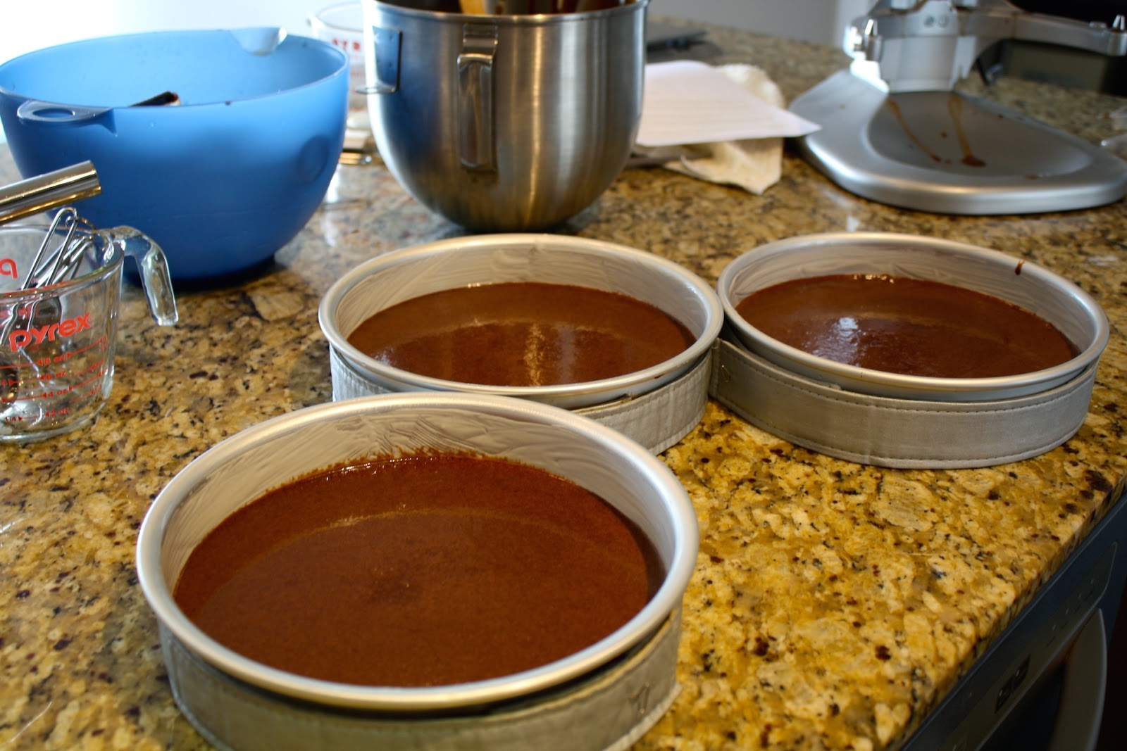 Cake batter in pans ready to bake.