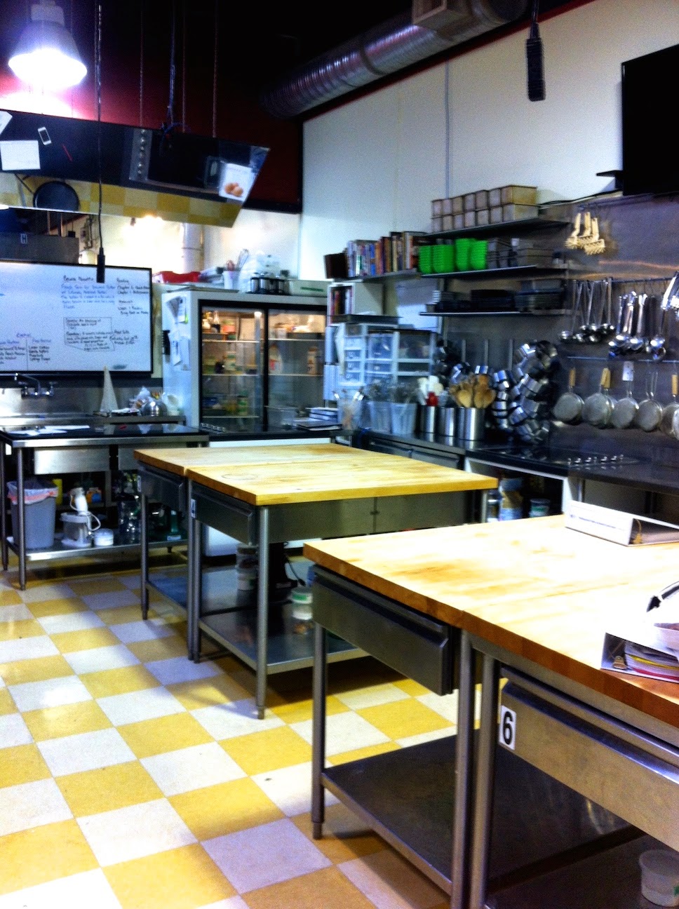 A kitchen with an island in the middle