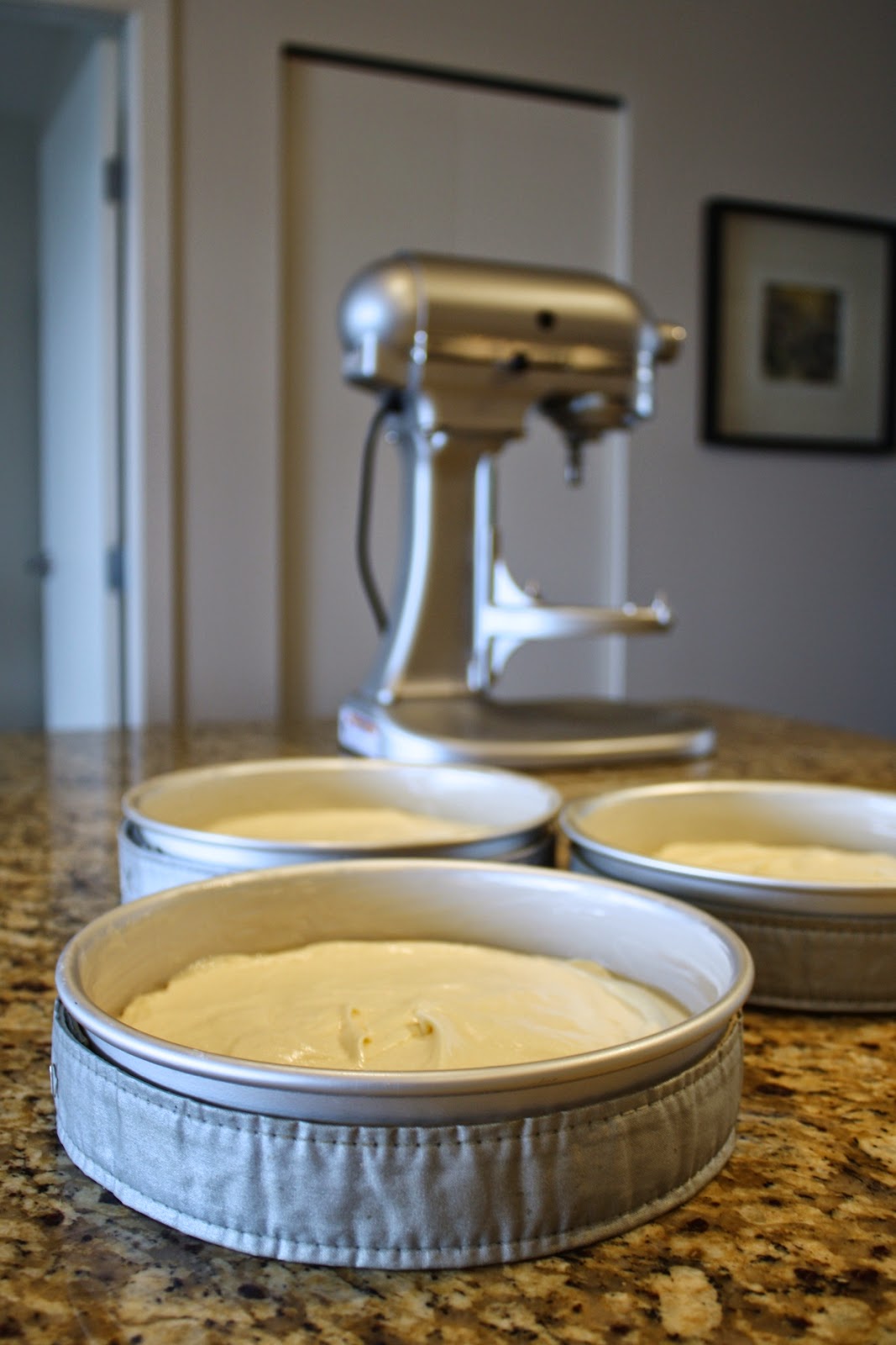 Cake batter in pans.