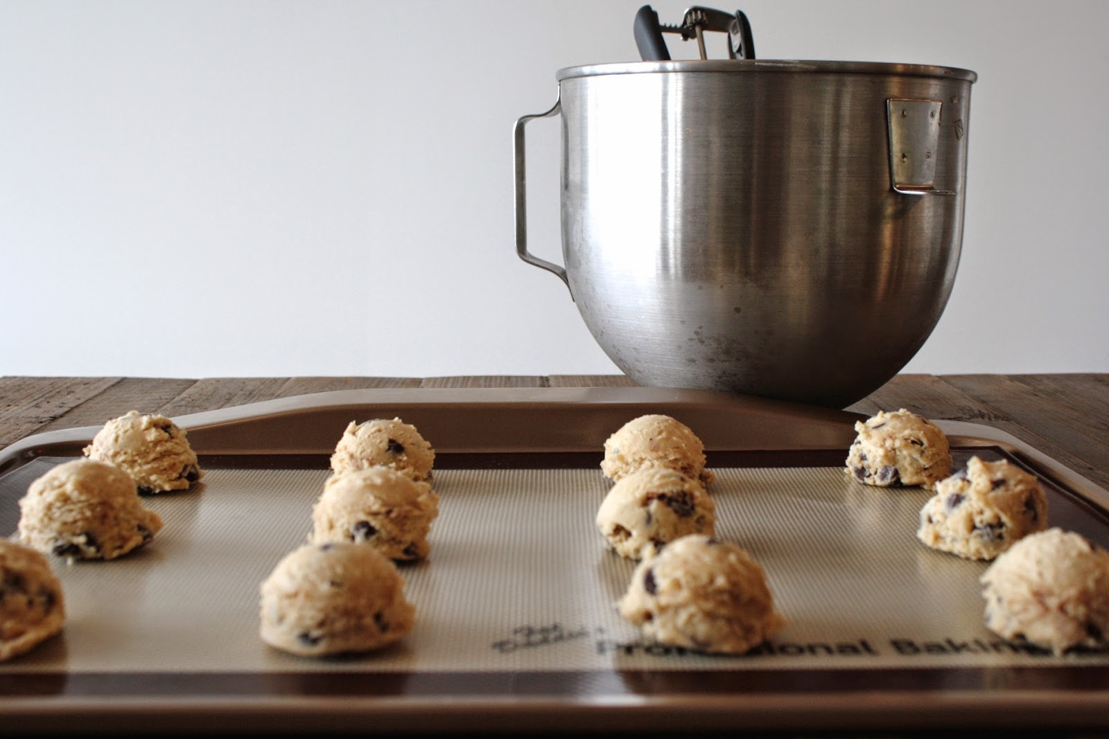 Cookie dough on a baking sheet.