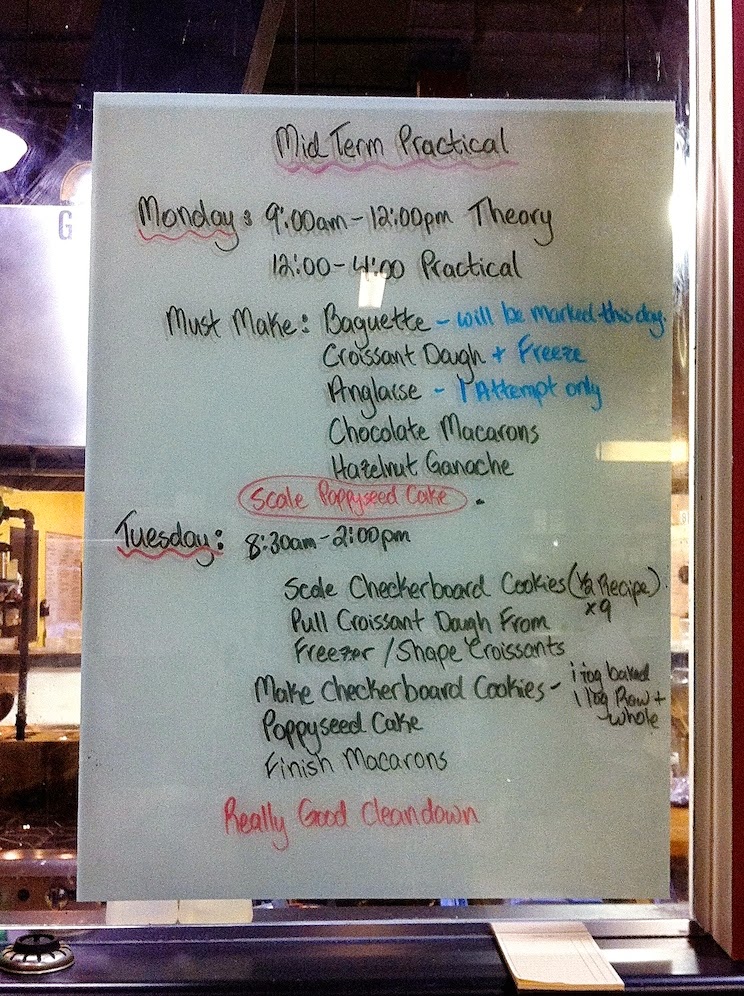 A close up of text on a white dry erase board